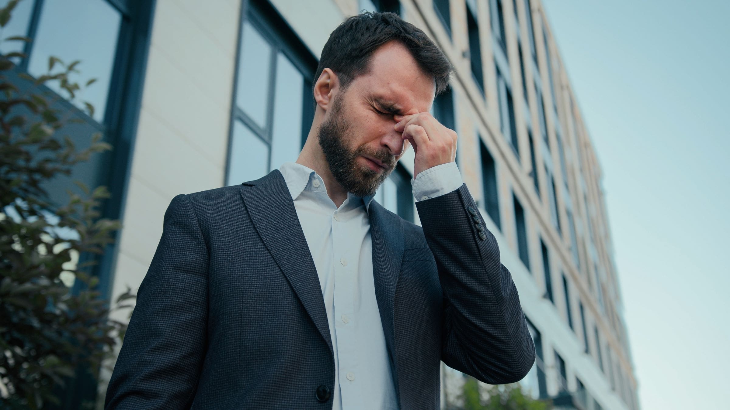 Business man dealing with issues. Nisus Psychology helps individuals deal with a crisis